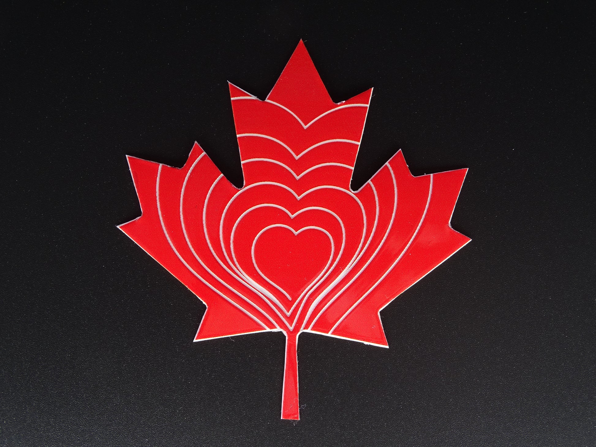 Canadian Compassion  Compass Sticker-Red maple leaf with hearts-directing compassion to yourself & fellow Canadians